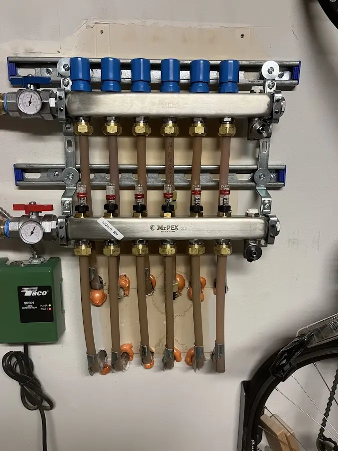 Plumber performing Leak Detection at a residential property in Wales